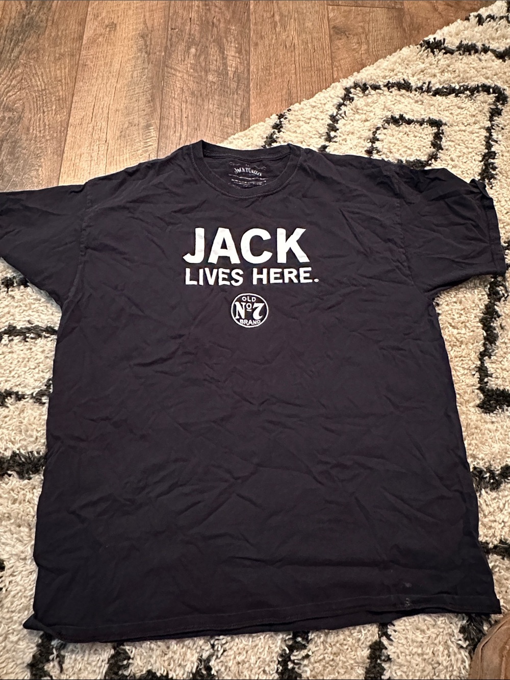 Jack Daniels Black Graphic Tee with White 'JACK LIVES HERE.' Print